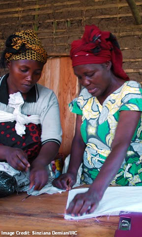 Picture of a refugee mother holding her baby