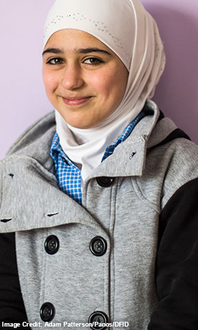 Picture of a refugee mother holding her baby