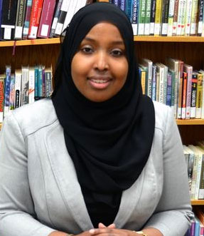 Picture of a refugee mother holding her baby